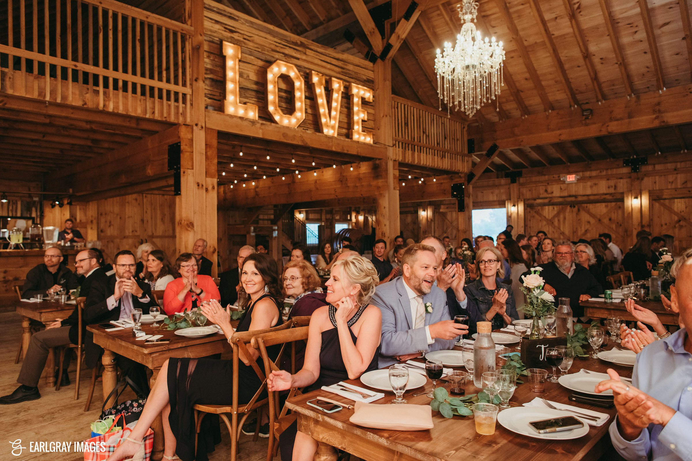 Guests at The Barn at Lions Garden Estate enjoying a speech. How to write the best best man speech.